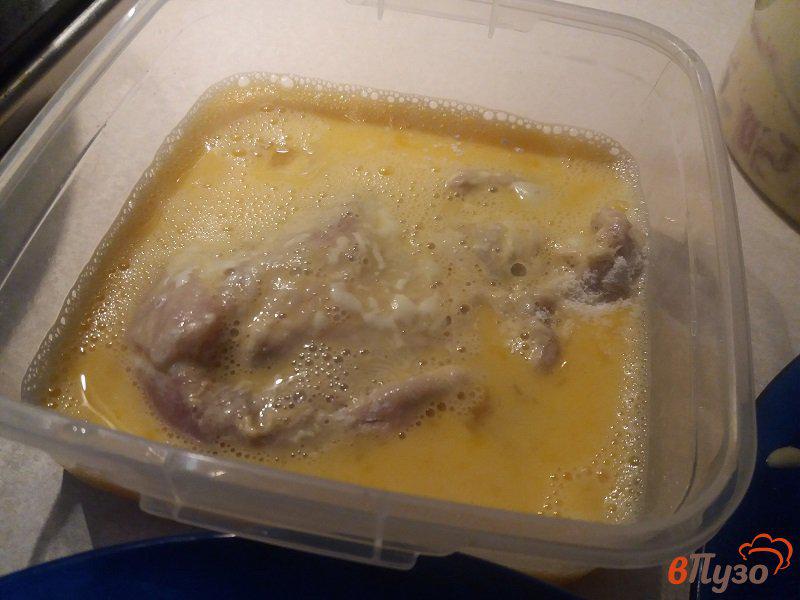 Фото приготовление рецепта: Отбивные из свинины в горчичном маринаде шаг №7