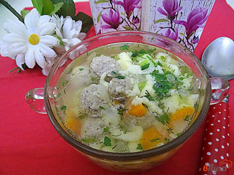 Фото приготовление рецепта: Суп с жидкими галушками и фрикадельками шаг №11
