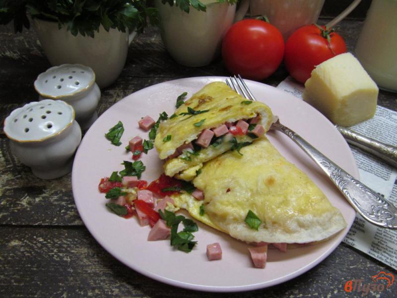 Фото приготовление рецепта: Омлет в лаваше с сыром и ветчиной шаг №7