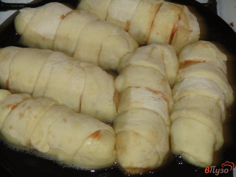 Фото приготовление рецепта: Сосиски в тесте с кетчупом шаг №12