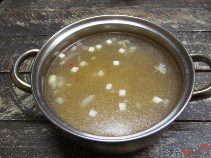 Фото приготовление рецепта: Восточный суп с вермишелью капустой и фрикадельками шаг №2