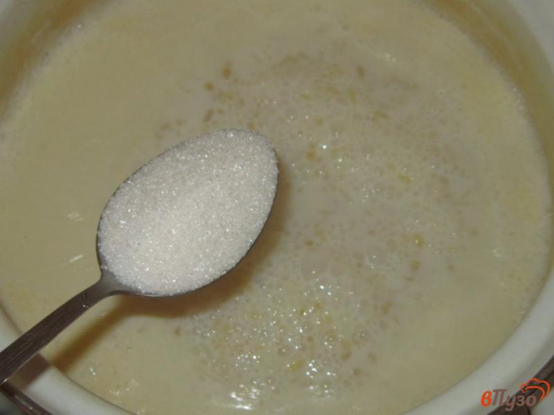 Фото приготовление рецепта: Молочная каша из риса и булгура шаг №3