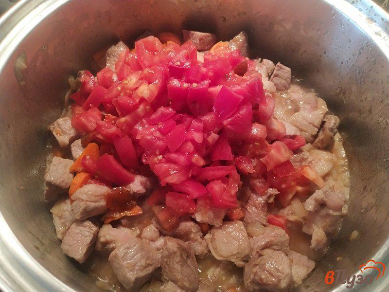 Фото приготовление рецепта: Пёркёльт из свинины по-венгерски шаг №7