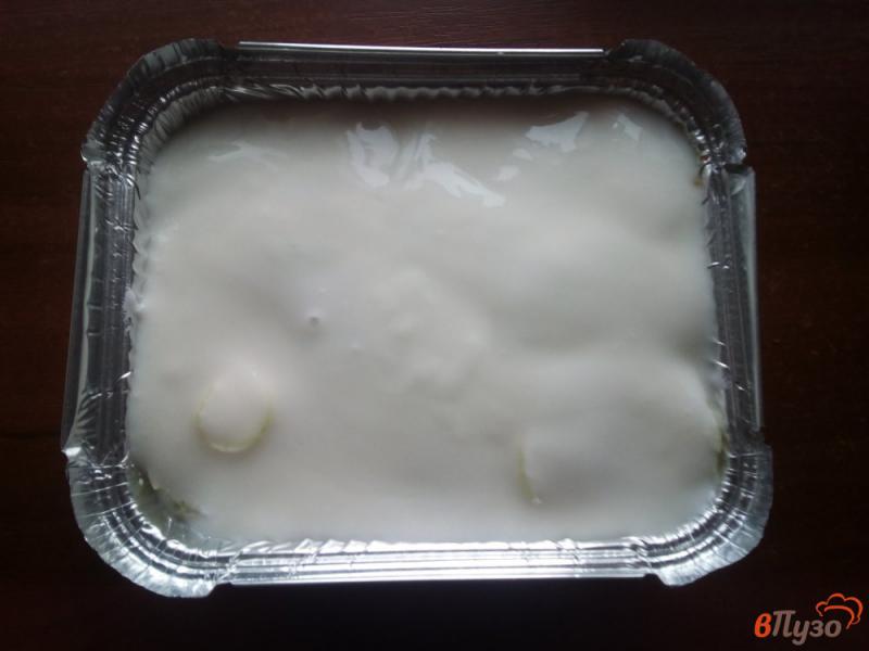 Фото приготовление рецепта: Хек запеченный в духовке с йогуртом шаг №9