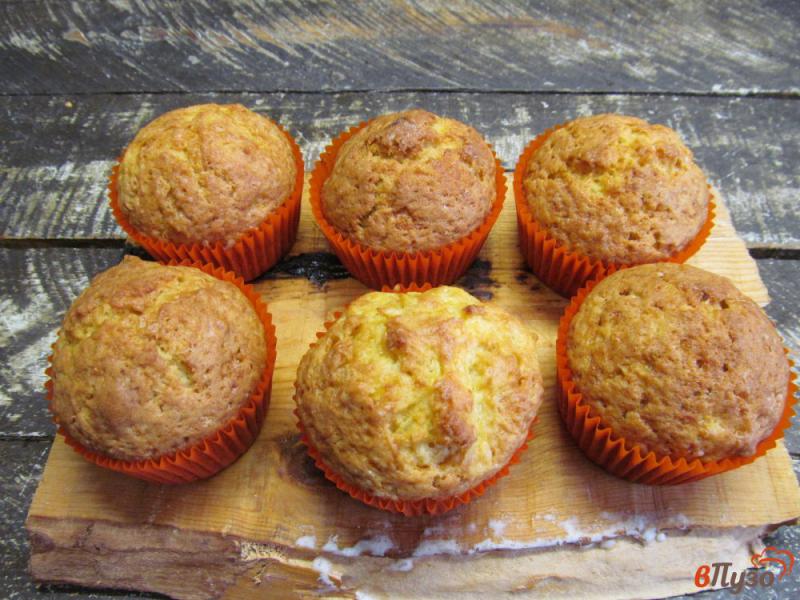 Фото приготовление рецепта: Апельсиновые кексы с шоколадом шаг №9