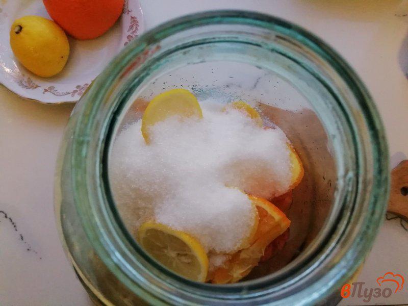 Фото приготовление рецепта: Фанта из абрикосов и цитрусовых шаг №3