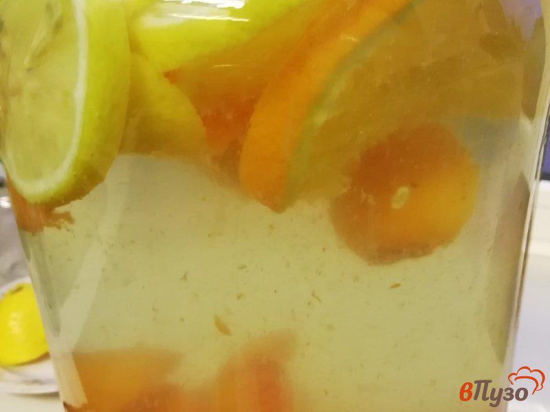 Фото приготовление рецепта: Фанта из абрикосов и цитрусовых шаг №4