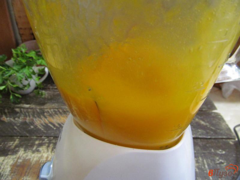 Фото приготовление рецепта: Овсяная каша на тыквенном пюре с апельсином шаг №2