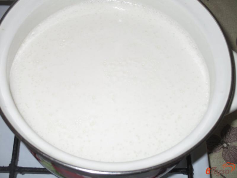 Фото приготовление рецепта: Молочная рисовая каша с корицей шаг №1