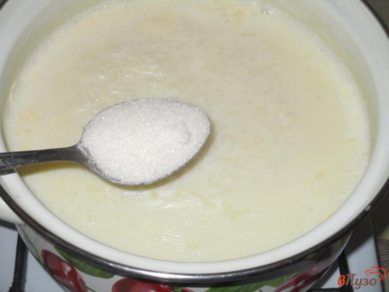 Фото приготовление рецепта: Молочная рисовая каша с корицей шаг №4