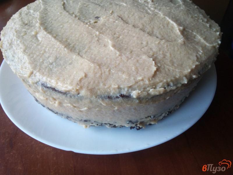 Фото приготовление рецепта: Торт из шоколадного бисквита с прослойкой из кокосовой стружки шаг №23