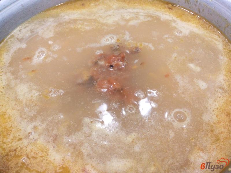 Фото приготовление рецепта: Пшенный суп с килькой и овощами шаг №8
