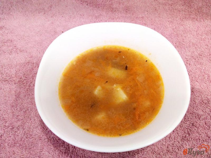 Фото приготовление рецепта: Пшенный суп с килькой и овощами шаг №9