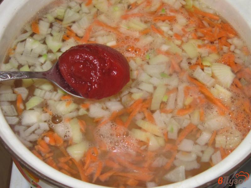 Фото приготовление рецепта: Рыбный суп из скумбрии шаг №3