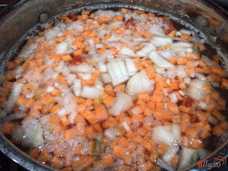 Фото приготовление рецепта: Овощной суп на бульоне минтая шаг №7