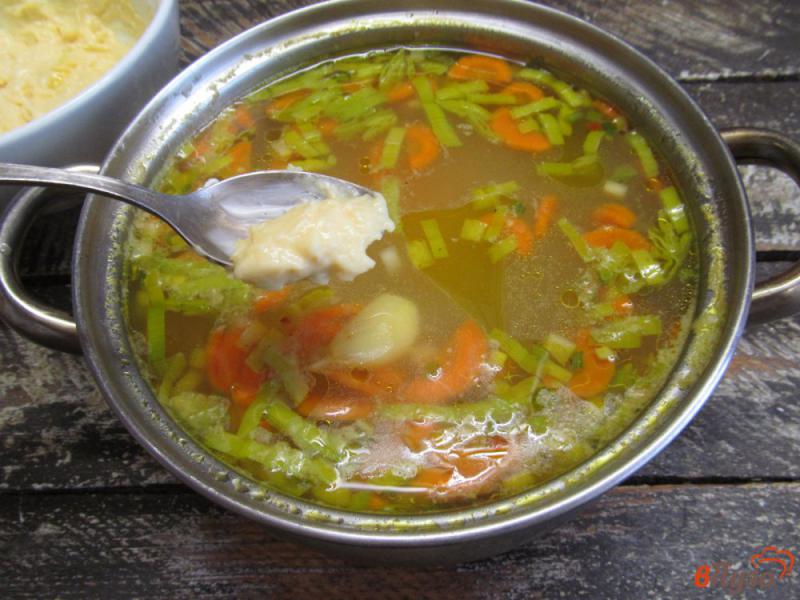 Фото приготовление рецепта: Рисовый суп с клецками из сыра шаг №7