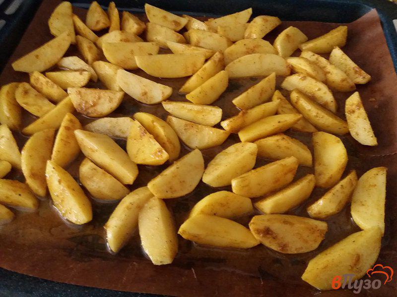 Фото приготовление рецепта: Картофель по-деревенски в духовке шаг №7