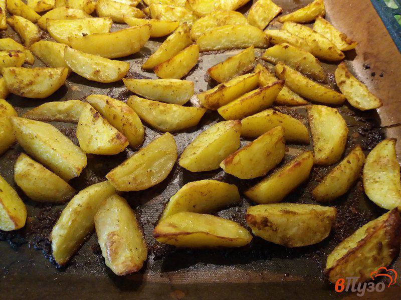 Фото приготовление рецепта: Картофель по-деревенски в духовке шаг №8