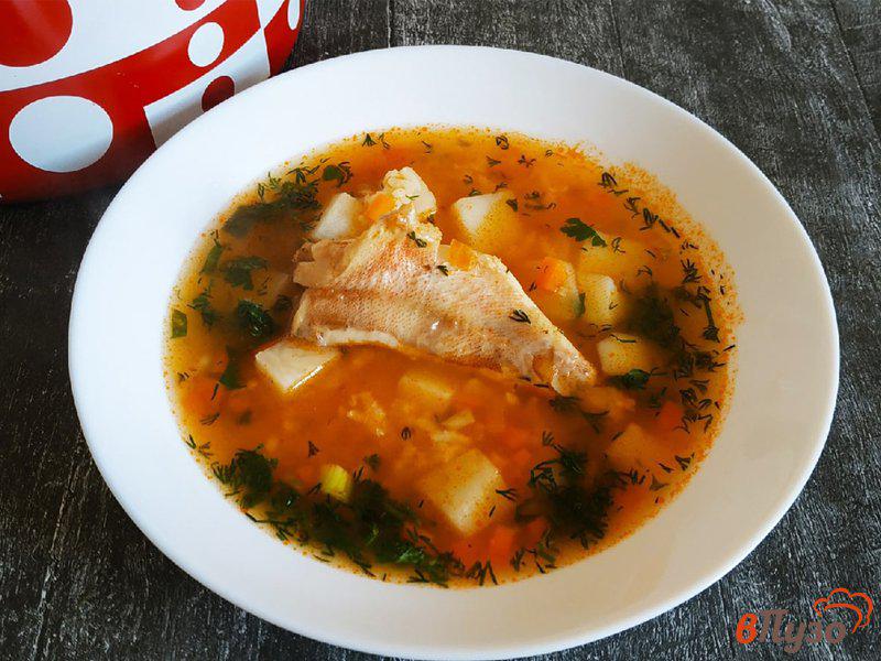 Фото приготовление рецепта: Рыбный суп с морским окунем шаг №8