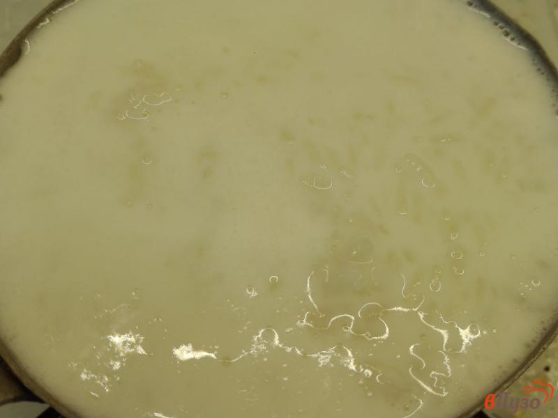 Фото приготовление рецепта: Рисовая каша с грецкими орехами и березовым сиропом шаг №2