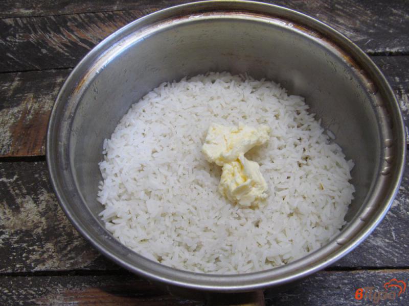 Фото приготовление рецепта: Рисовая каша из книги В.В. Похлебкина шаг №7