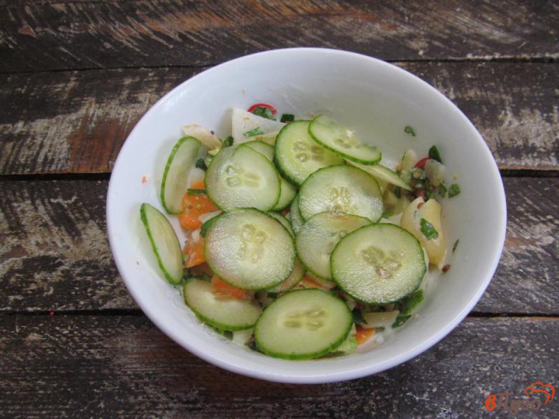 Фото приготовление рецепта: Картофельный салат с огурцом и сельдереем шаг №6