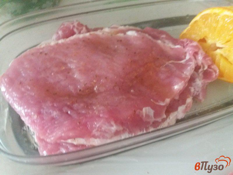 Фото приготовление рецепта: Отбивные из свинины в апельсиновом маринаде шаг №5