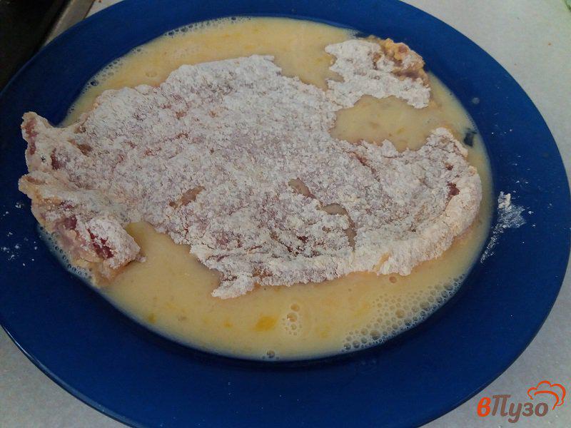 Фото приготовление рецепта: Отбивные из свинины в апельсиновом маринаде шаг №8