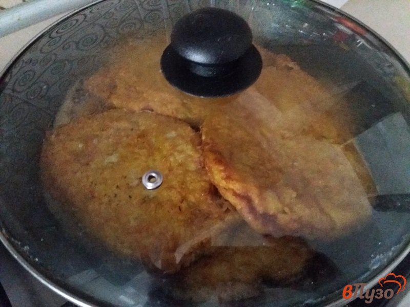 Фото приготовление рецепта: Отбивные из свинины в апельсиновом маринаде шаг №13