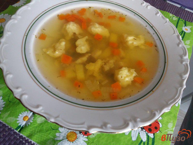 Фото приготовление рецепта: Куриный суп с клецками шаг №12