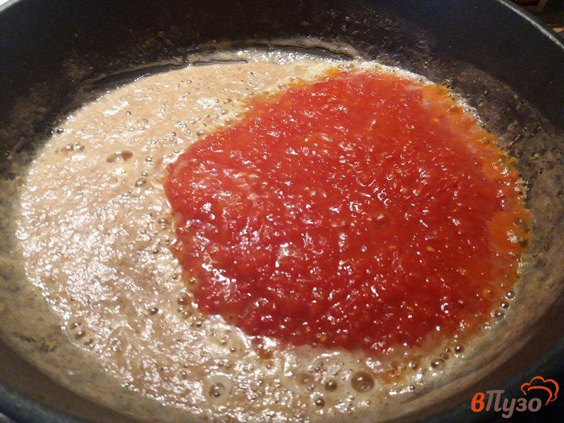 Фото приготовление рецепта: Тефтели в томатном соусе шаг №8