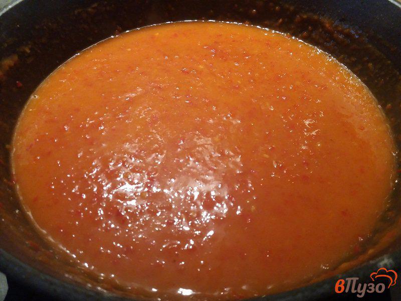 Фото приготовление рецепта: Тефтели в томатном соусе шаг №9