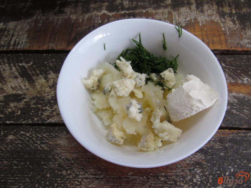 Фото приготовление рецепта: Запеченный картофель с начинкой из свиных ребер шаг №4