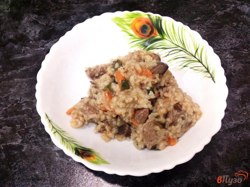 Фото приготовление рецепта: Рис с овощами и свиной печенью шаг №7