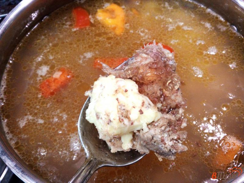 Фото приготовление рецепта: Гречневый суп с овощами и тушенкой шаг №7