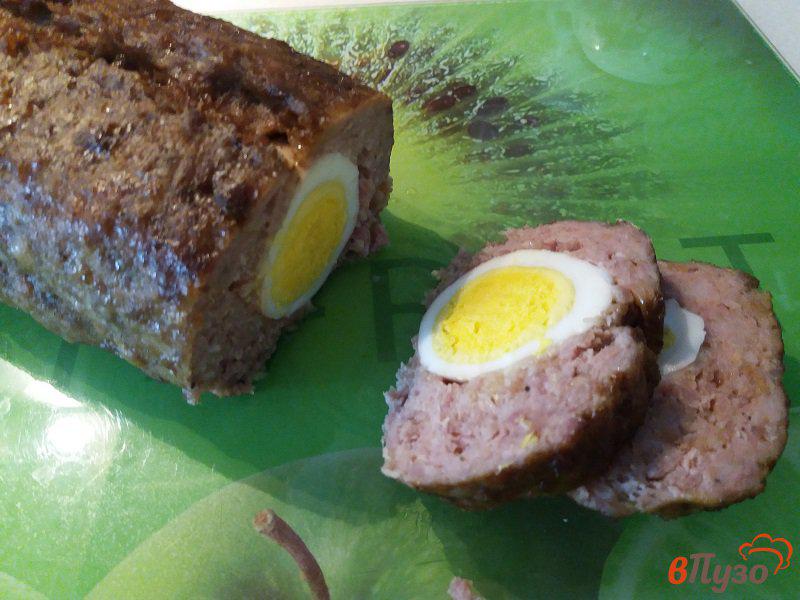 Фото приготовление рецепта: Мясной рулет с яйцом шаг №13