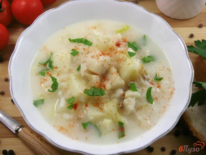 Фото приготовление рецепта: Суп сырный с треской и рисом шаг №6
