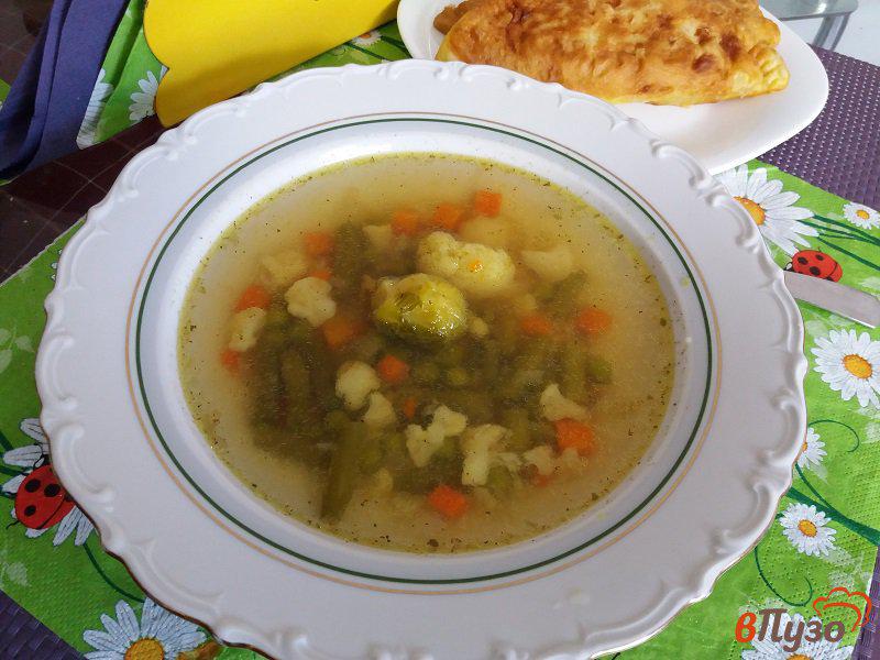 Фото приготовление рецепта: Куриный суп с овощами шаг №7