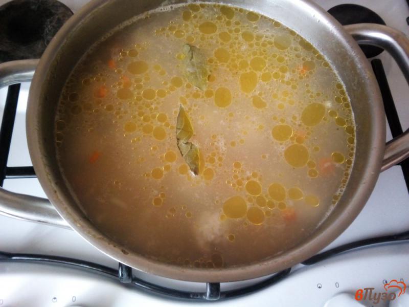 Фото приготовление рецепта: Суп на курином бульоне с рисом и фрикадельками шаг №8