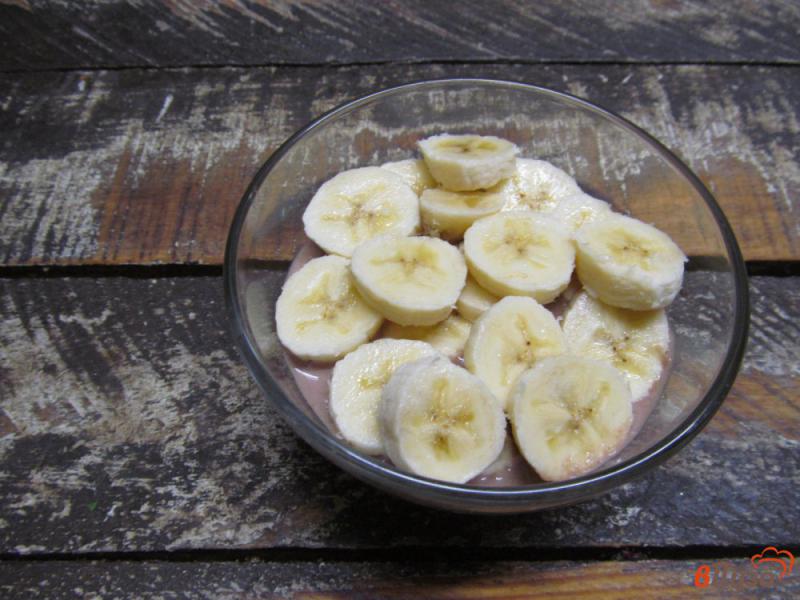 Фото приготовление рецепта: Шоколадная овсянка с бананом и семенами чиа шаг №7