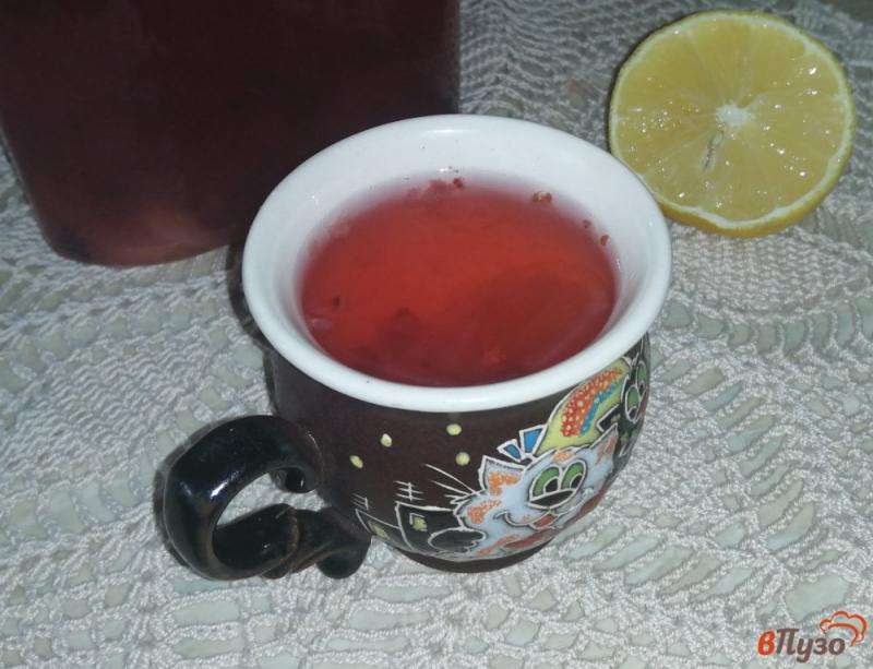 Фото приготовление рецепта: Напиток из клюквы с имбирем и лимоном шаг №7