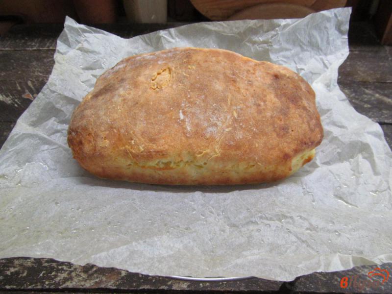 Фото приготовление рецепта: Пирог из творожного теста с джемом и изюмом шаг №10