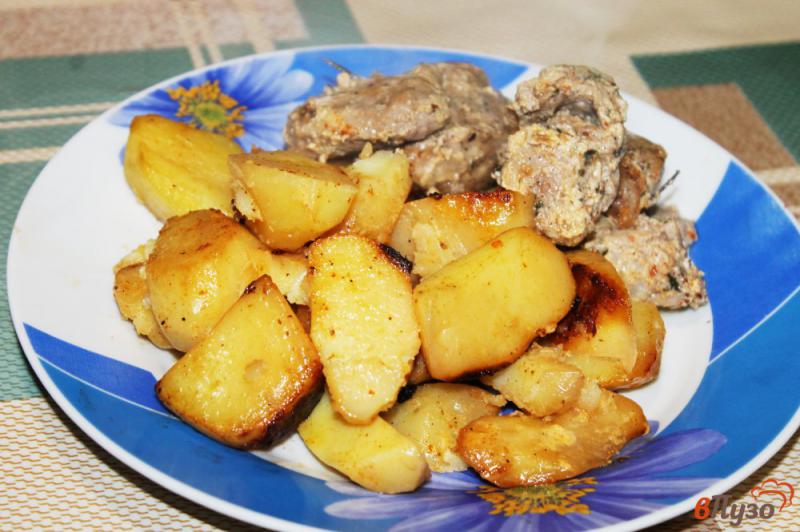Фото приготовление рецепта: Картофель дольками с паприкой в рукаве шаг №6