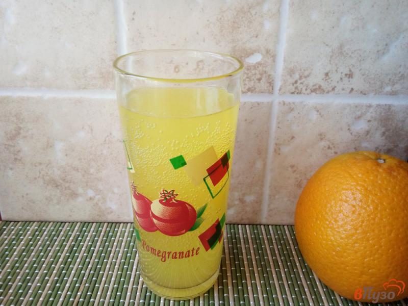Фото приготовление рецепта: Апельсиновый напиток шаг №9