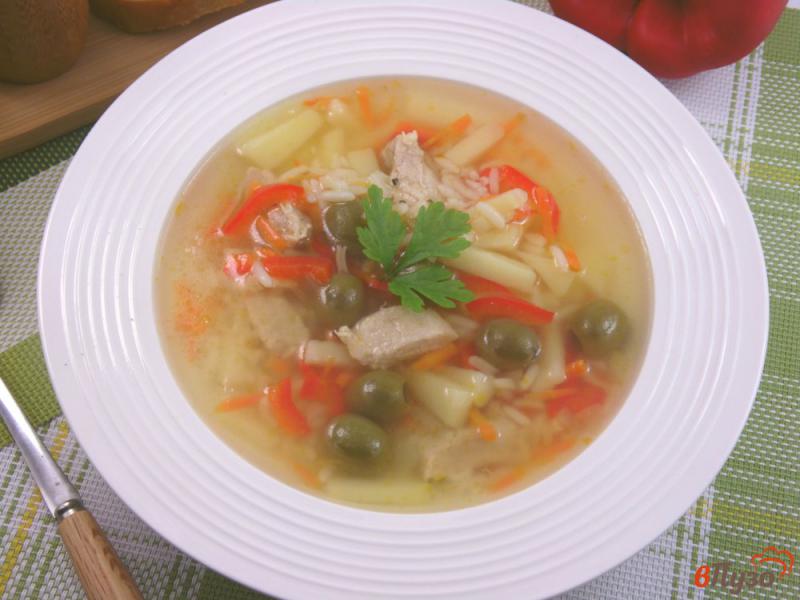 Фото приготовление рецепта: Суп мясной с рисом и оливками шаг №8
