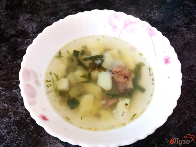 Фото приготовление рецепта: Зеленый суп с горошком и тушенкой шаг №7