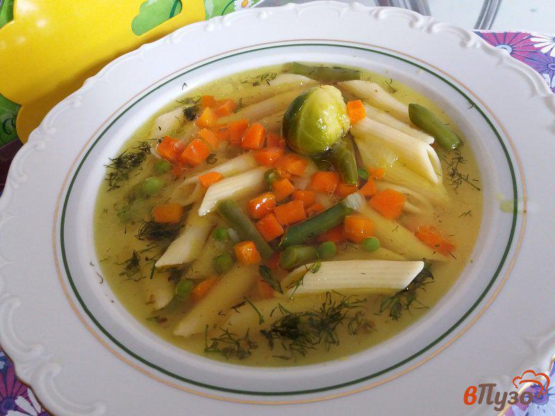 Фото приготовление рецепта: Куриный суп с овощами и пастой шаг №8