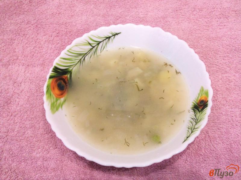 Фото приготовление рецепта: Рисовый суп с зеленым горошком и овощами шаг №7