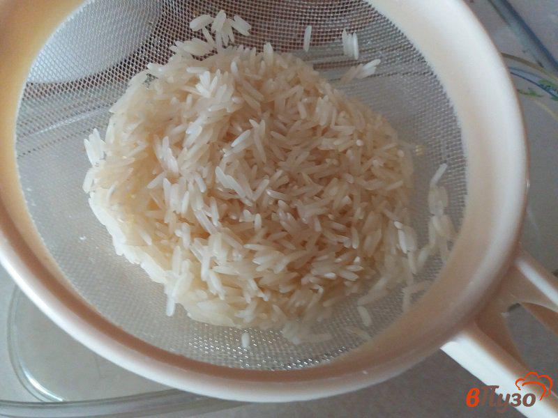 Фото приготовление рецепта: Куриный суп с рисом шаг №3