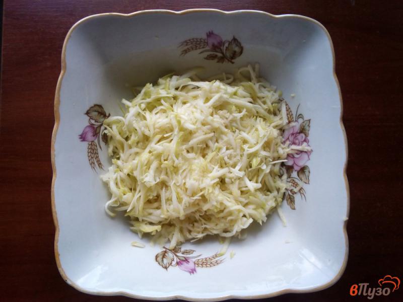 Фото приготовление рецепта: Запеканка из риса и кабачка с мясными шариками шаг №2